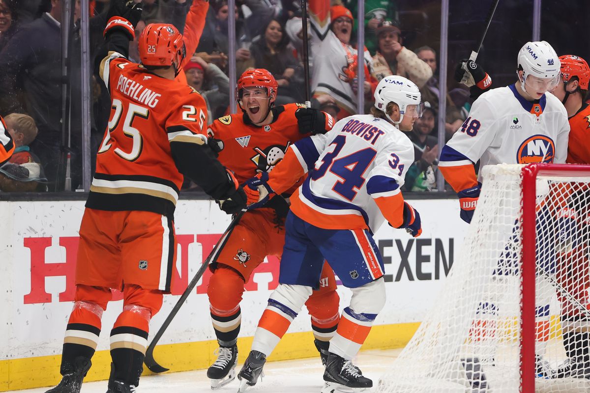 Anaheim Ducks center Ryan Poehling (25) celebrates a goal with a teammate during an NHL game against the New York Islanders on March 4, 2026 in Anaheim, CA. Anaheim Ducks center Ryan Poehling (25) celebrates a goal with a teammate during an NHL game against the New York Islanders on March 4, 2026 in Anaheim, CA.