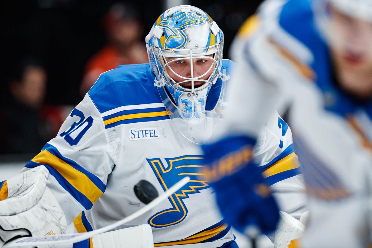 St. Louis Blues goaltender Joel Hofer (30) deflects a puck during warmups before an NHL match against the Anaheim Ducks on March 8, 2026 in Anaheim, California. St. Louis Blues goaltender Joel Hofer (30) deflects a puck during warmups before an NHL match against the Anaheim Ducks on March 8, 2026 in Anaheim, California.