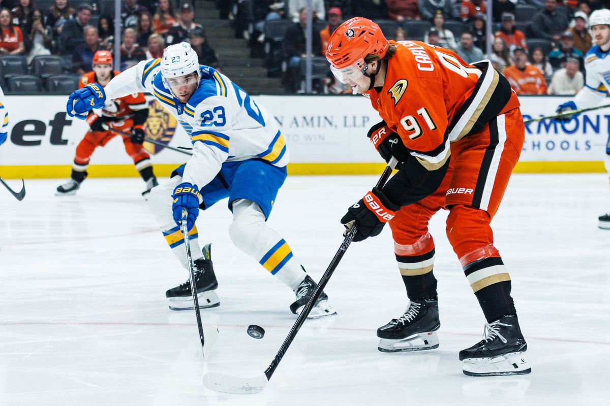 Anaheim Ducks center Leo Carlsson (91) defends the puck during an NHL match against the St. Louis Blues on March 8, 2026 in Anaheim, California. Anaheim Ducks center Leo Carlsson (91) defends the puck during an NHL match against the St. Louis Blues on March 8, 2026 in Anaheim, California.