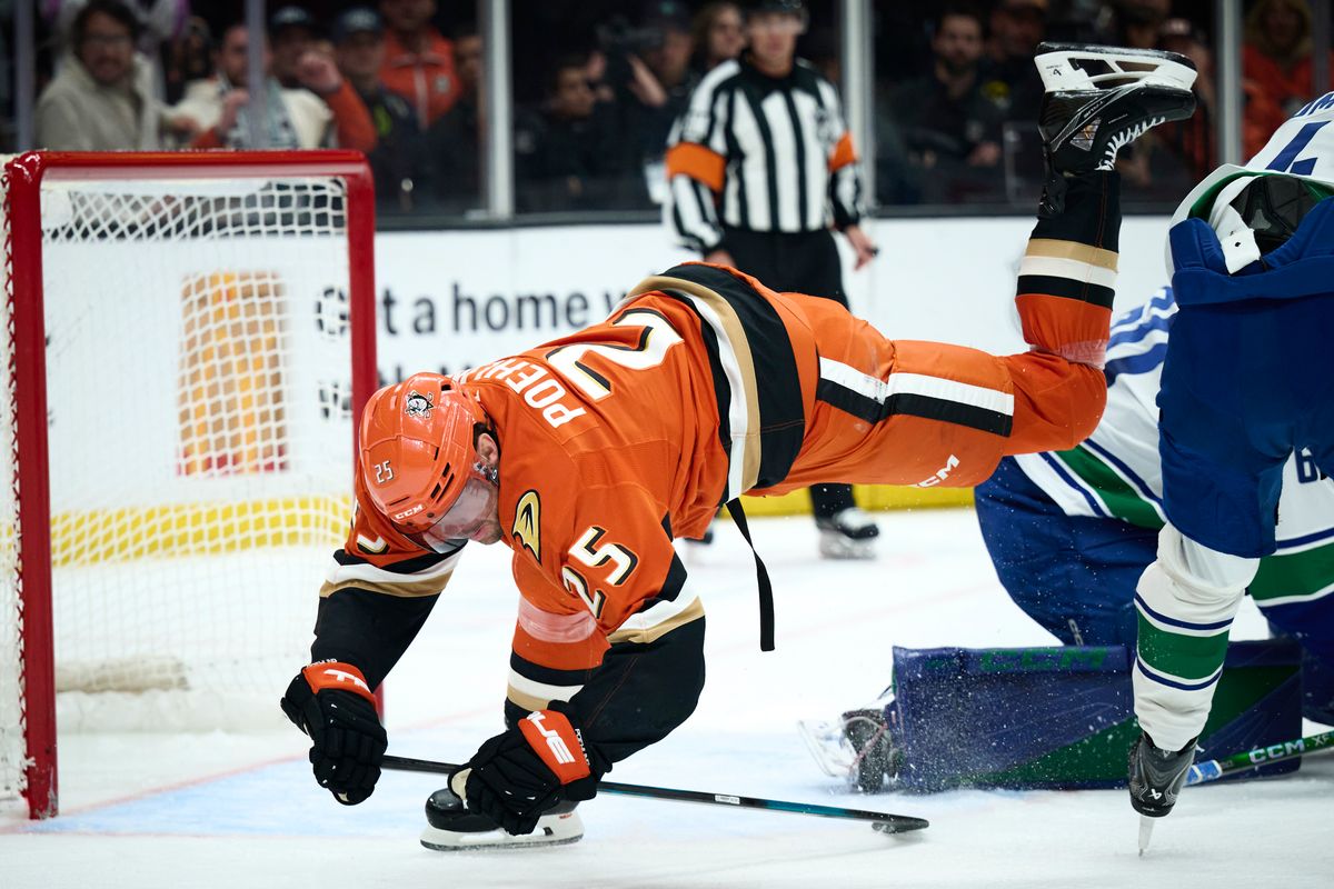 The Anaheim Duck’s Ryan Poehling #25 fights for the puck during an NHL game against the Vancouver Canucks, April 12th, 2026 in Anaheim California. The Anaheim Duck’s Ryan Poehling #25 fights for the puck during an NHL game against the Vancouver Canucks, April 12th, 2026 in Anaheim California.