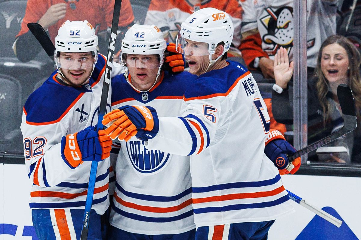 Kasperi Kapanen #42 of the Edmonton Oilers (center) celebrates with teammates Vasily Podkolzin #92 (left) and Connor Murphy #5 (right after scoring a goal during an NHL Playoffs game against the Anaheim Ducks on April 24, 2026 at Honda Center in Anaheim, California. Kasperi Kapanen #42 of the Edmonton Oilers (center) celebrates with teammates Vasily Podkolzin #92 (left) and Connor Murphy #5 (right after scoring a goal during an NHL Playoffs game against the Anaheim Ducks on April 24, 2026 at Honda Center in Anaheim, California.
