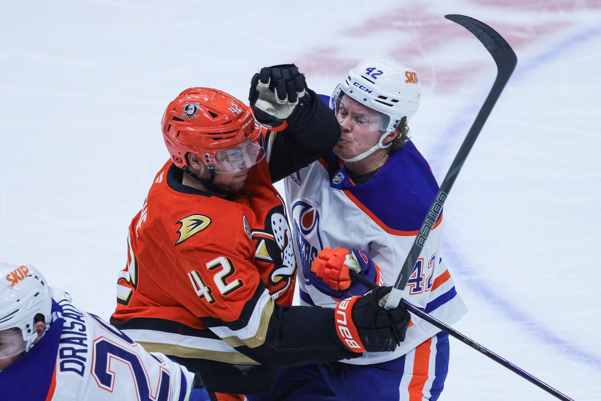 Anaheim Ducks center Tim Washe (42) pushes Edmonton Oilers right wing Kasperi Kapanen (42) during the NHL game against the Edmonton Oilers, Thursday April 30th, 2026 at Honda Center in Anaheim, Calif. Anaheim Ducks center Tim Washe (42) pushes Edmonton Oilers right wing Kasperi Kapanen (42) during the NHL game against the Edmonton Oilers, Thursday April 30th, 2026 at Honda Center in Anaheim, Calif.