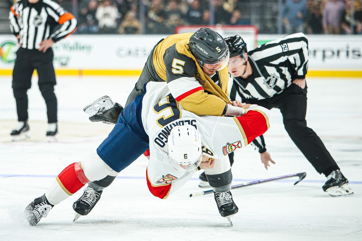 Vegas Golden Knights D Jeremy Lauzon (5) fights with Florida Panthers D Donovan Sebrango (6) during an NHL game on Monday November 10, 2025, in Las Vegas, Nevada. Vegas Golden Knights D Jeremy Lauzon (5) fights with Florida Panthers D Donovan Sebrango (6) during an NHL game on Monday November 10, 2025, in Las Vegas, Nevada.