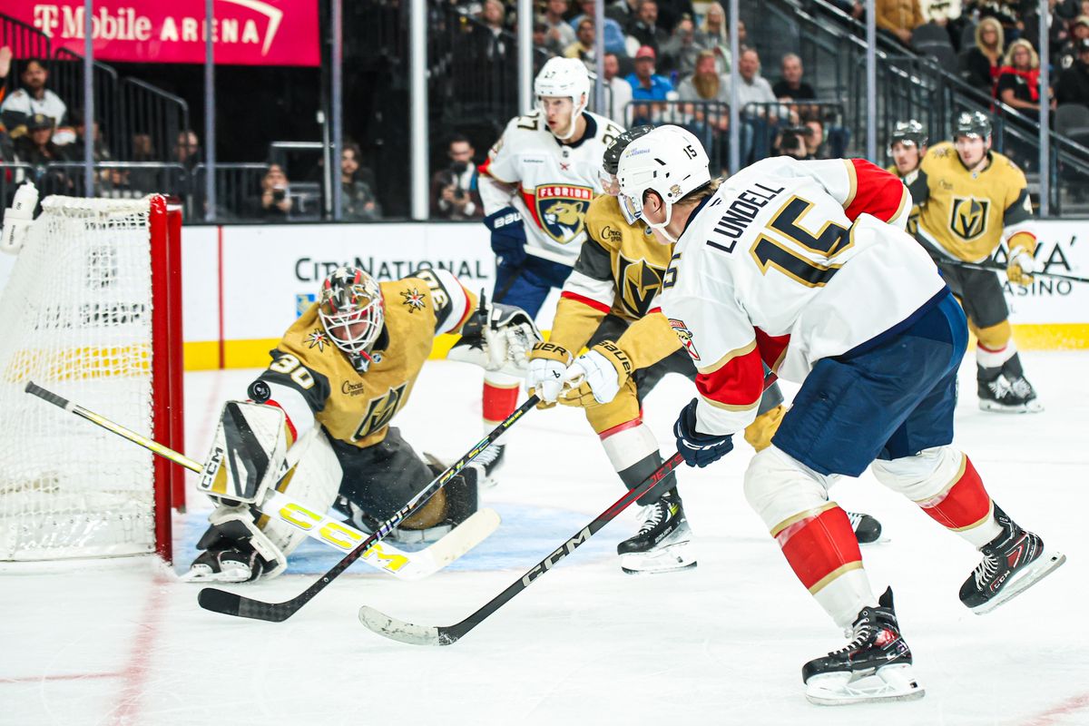 Vegas Golden Knights G Carl Lindbom (30) makes a save against Florida Panthers C Anton Lundell (15) during an NHL game on Monday November 10, 2025, in Las Vegas, Nevada. Vegas Golden Knights G Carl Lindbom (30) makes a save against Florida Panthers C Anton Lundell (15) during an NHL game on Monday November 10, 2025, in Las Vegas, Nevada.