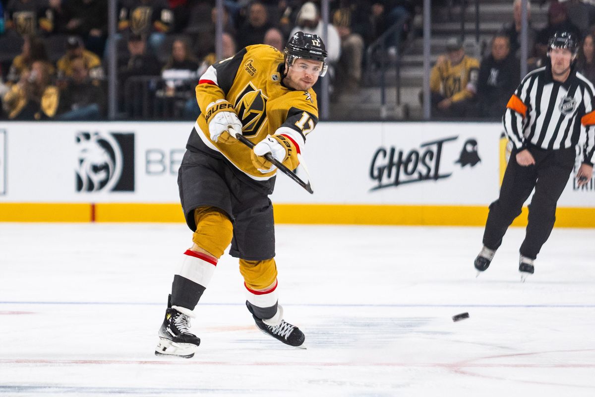Vegas Golden Knights defenseman Ben Hutton (17) dumps the puck into the offensive zone during a NHL game between the Vegas Golden Knights and the Chicago Blackhawks, Tuesday December 2, 2025 in Las Vegas, Nev. Vegas Golden Knights defenseman Ben Hutton (17) dumps the puck into the offensive zone during a NHL game between the Vegas Golden Knights and the Chicago Blackhawks, Tuesday December 2, 2025 in Las Vegas, Nev.
