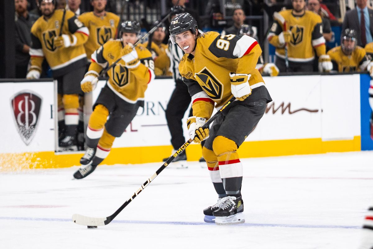 Vegas Golden Knights right-wing Mitch Marner (93) skates the puck into the offensive zone during a NHL game between the Vegas Golden Knights and the Chicago Blackhawks, Tuesday December 2, 2025 in Las Vegas, Nev. Vegas Golden Knights right-wing Mitch Marner (93) skates the puck into the offensive zone during a NHL game between the Vegas Golden Knights and the Chicago Blackhawks, Tuesday December 2, 2025 in Las Vegas, Nev.