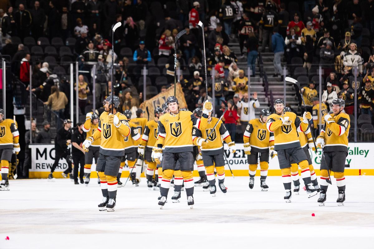 Vegas Golden Knights raise their sticks to the fans after a NHL game between the Vegas Golden Knights and the Chicago Blackhawks, Tuesday December 2, 2025 in Las Vegas, Nev. Vegas Golden Knights raise their sticks to the fans after a NHL game between the Vegas Golden Knights and the Chicago Blackhawks, Tuesday December 2, 2025 in Las Vegas, Nev.