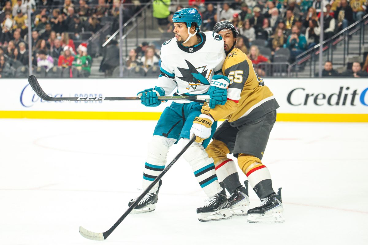 San Jose Sharks F Ryan Reaves (75) hits Vegas Golden Knights F Keegan Kolesar (55) during an NHL game on Tuesday December 23, 2025, in Las Vegas, Nevada. San Jose Sharks F Ryan Reaves (75) hits Vegas Golden Knights F Keegan Kolesar (55) during an NHL game on Tuesday December 23, 2025, in Las Vegas, Nevada.