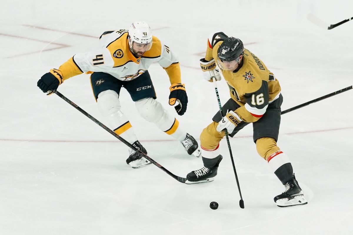 Vegas Golden Knights right wing Pavel Dorofeyev (16) states the puck down the ice while attempting to get past Nashville Predators defensemen Nicolas Hague (41) during first period of NHL game against Nashville Predators on Saturday Jan. 17, 2026 at T-Mobile Arena in Las Vegas. Vegas Golden Knights right wing Pavel Dorofeyev (16) states the puck down the ice while attempting to get past Nashville Predators defensemen Nicolas Hague (41) during first period of NHL game against Nashville Predators on Saturday Jan. 17, 2026 at T-Mobile Arena in Las Vegas.