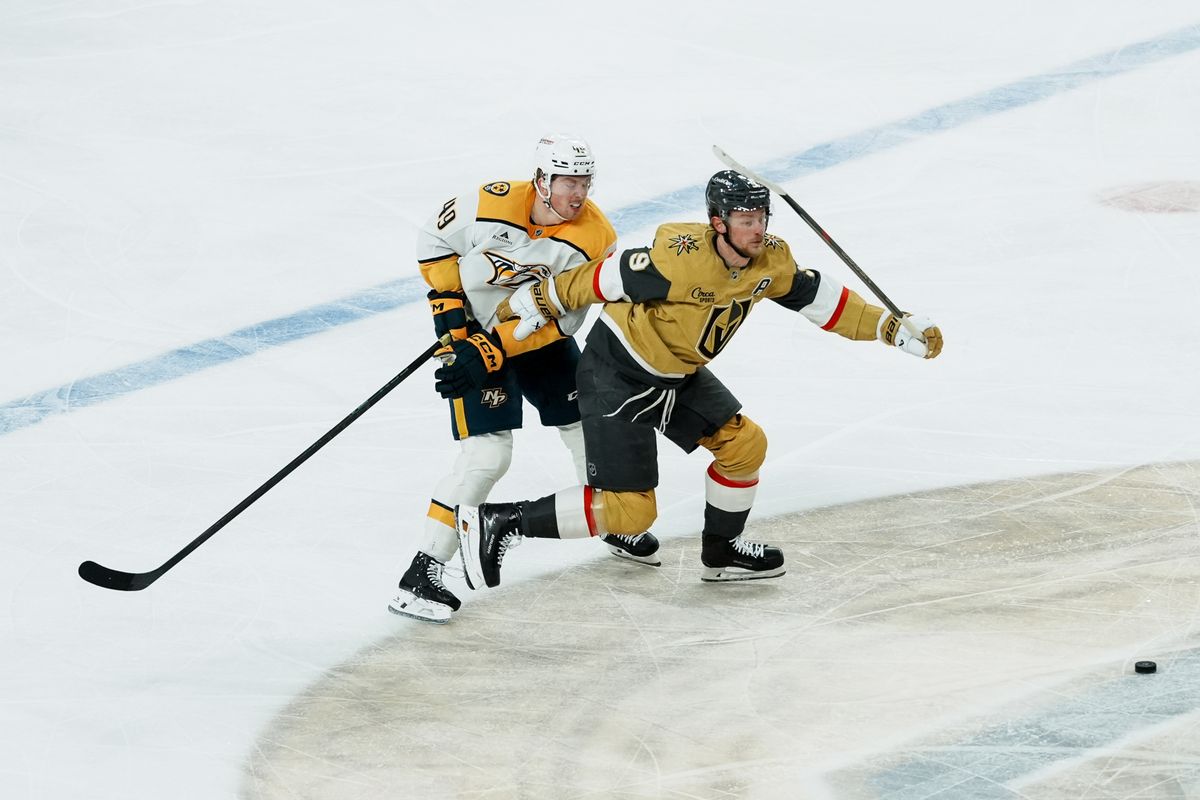 Vegas Golden Knights center Jack Eichel (9) and Nashville Predators left wing Reid Schaefer (49) race to the puck during second period of NHL game against Nashville Predators on Saturday Jan. 17, 2026 at T-Mobile Arena in Las Vegas. Vegas Golden Knights center Jack Eichel (9) and Nashville Predators left wing Reid Schaefer (49) race to the puck during second period of NHL game against Nashville Predators on Saturday Jan. 17, 2026 at T-Mobile Arena in Las Vegas.