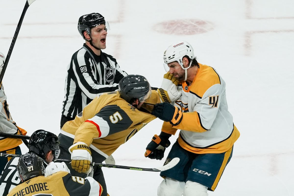 Vegas Golden Knights defenseman Jeremy Lauzon (5) and Nashville Predators Nicolas Hague (41) get into a fight during second period of NHL game against Nashville Predators on Saturday Jan. 17, 2026 at T-Mobile Arena in Las Vegas. Vegas Golden Knights defenseman Jeremy Lauzon (5) and Nashville Predators Nicolas Hague (41) get into a fight during second period of NHL game against Nashville Predators on Saturday Jan. 17, 2026 at T-Mobile Arena in Las Vegas.