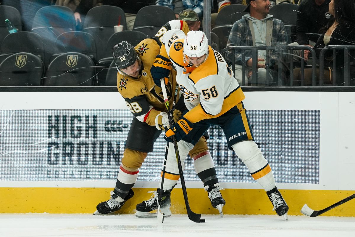 Vegas Golden Knights center Tanner Laczynski (28) and Nashville Predators left wing Michael Bunting (58) battle for the puck during third period of NHL game against Nashville Predators on Saturday Jan. 17, 2026 at T-Mobile Arena in Las Vegas. Vegas Golden Knights center Tanner Laczynski (28) and Nashville Predators left wing Michael Bunting (58) battle for the puck during third period of NHL game against Nashville Predators on Saturday Jan. 17, 2026 at T-Mobile Arena in Las Vegas.