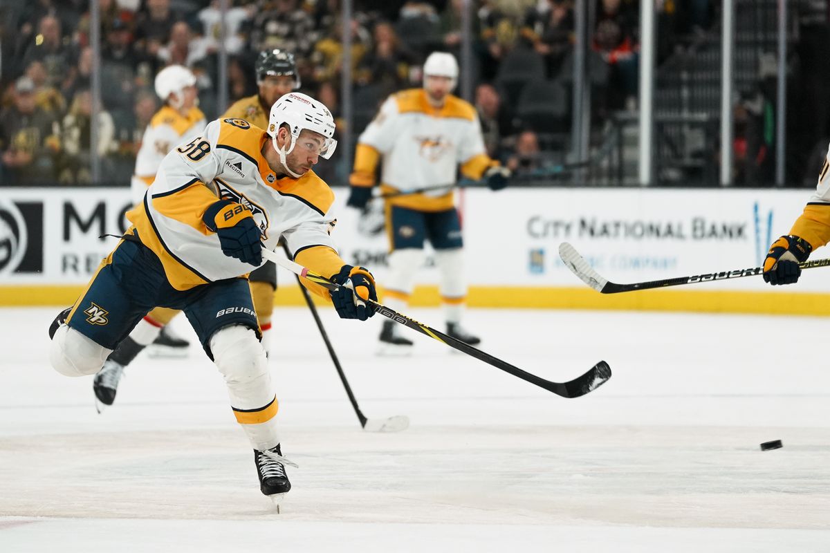 Nashville Predators defenseman left wing Michael Bunting (58) shoots the puck during third period of NHL game against Vegas Golden Knights on Saturday Jan. 17, 2026 at T-Mobile Arena in Las Vegas. Nashville Predators defenseman left wing Michael Bunting (58) shoots the puck during third period of NHL game against Vegas Golden Knights on Saturday Jan. 17, 2026 at T-Mobile Arena in Las Vegas.