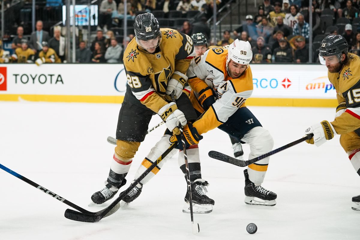 Vegas Golden Knights center Tanner Laczynski (28) and Nashville Predators center Ryan O’Reilly (90) battle for the puck during third period of NHL game against Nashville Predators on Saturday Jan. 17, 2026 at T-Mobile Arena in Las Vegas. Vegas Golden Knights center Tanner Laczynski (28) and Nashville Predators center Ryan O’Reilly (90) battle for the puck during third period of NHL game against Nashville Predators on Saturday Jan. 17, 2026 at T-Mobile Arena in Las Vegas.