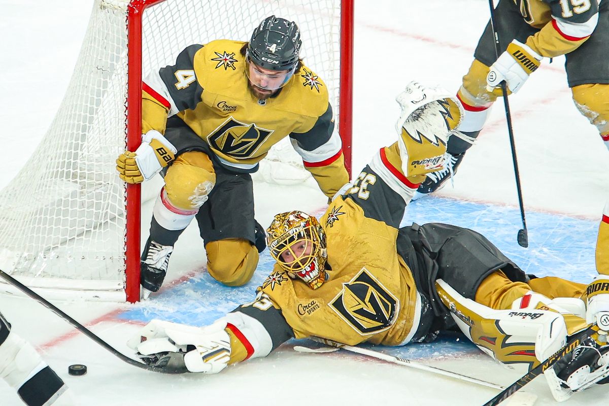 Vegas Golden Knights G Adin Hill (33) reaches for the puck during an NHL game against the Los Angeles Kings on Thursday February 5, 2026, in Las Vegas, Nevada. Vegas Golden Knights G Adin Hill (33) reaches for the puck during an NHL game against the Los Angeles Kings on Thursday February 5, 2026, in Las Vegas, Nevada.