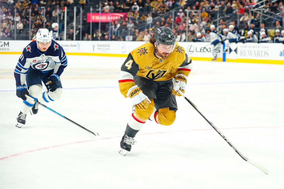 Vegas Golden Knights D Rasmus Andersson (4) outskates past Winnipeg Jets F Cole Perfetti (91) to draw an icing during an NHL game on Monday, April 13, 2026, in Las Vegas, Nevada. Vegas Golden Knights D Rasmus Andersson (4) outskates past Winnipeg Jets F Cole Perfetti (91) to draw an icing during an NHL game on Monday, April 13, 2026, in Las Vegas, Nevada.