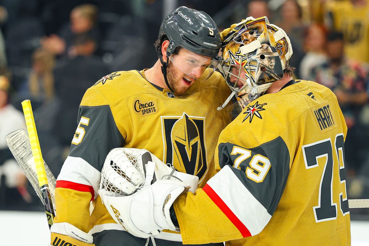Vegas Golden Knights D Jeremy Lauzon (5) celebrates with his teammate Vegas Golden Knights G Carter Hart (79) after defeating the Winnipeg Jets on Monday, April 13, 2026, in Las Vegas, Nevada. Vegas Golden Knights D Jeremy Lauzon (5) celebrates with his teammate Vegas Golden Knights G Carter Hart (79) after defeating the Winnipeg Jets on Monday, April 13, 2026, in Las Vegas, Nevada.