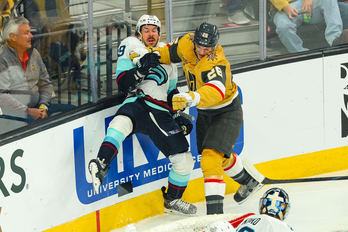 Vegas Golden Knights F Nic Dowd (26) lays a hit on Seattle Kraken F Freddy Gaudreau (89) on Wednesday, April 15, 2026, in Las Vegas, Nevada. Vegas Golden Knights F Nic Dowd (26) lays a hit on Seattle Kraken F Freddy Gaudreau (89) on Wednesday, April 15, 2026, in Las Vegas, Nevada.