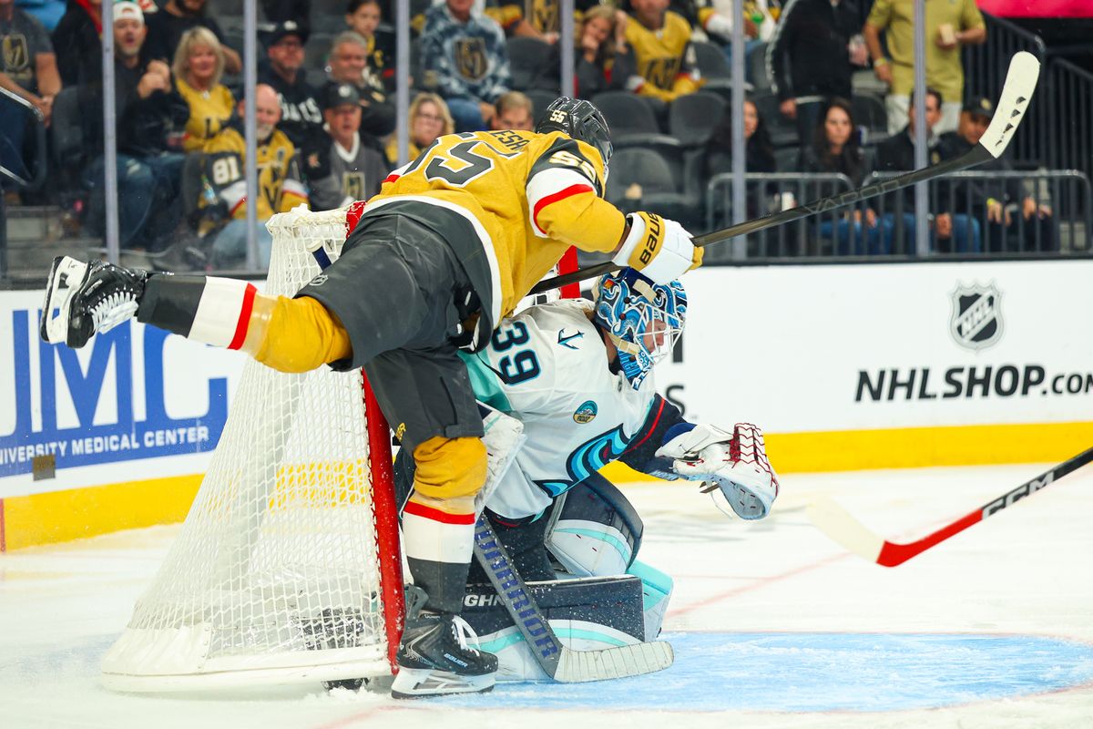Vegas Golden Knights F Keegan Kolesar (55) falls on top of Seattle Kraken G Nikke Kokko (39) during an NHL game on Wednesday, April 15, 2026, in Las Vegas, Nevada. Vegas Golden Knights F Keegan Kolesar (55) falls on top of Seattle Kraken G Nikke Kokko (39) during an NHL game on Wednesday, April 15, 2026, in Las Vegas, Nevada.