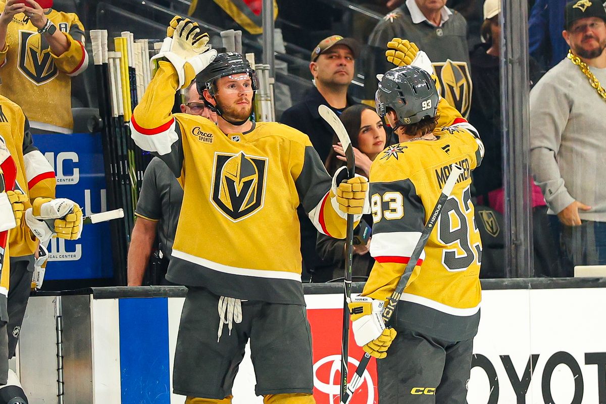 Vegas Golden Knights D Jeremy Lauzon (5) and his teammate F Mitch Marner (93) high-five after defeating the Seattle Kraken on Wednesday, April 15, 2026, in Las Vegas, Nevada. Vegas Golden Knights D Jeremy Lauzon (5) and his teammate F Mitch Marner (93) high-five after defeating the Seattle Kraken on Wednesday, April 15, 2026, in Las Vegas, Nevada.