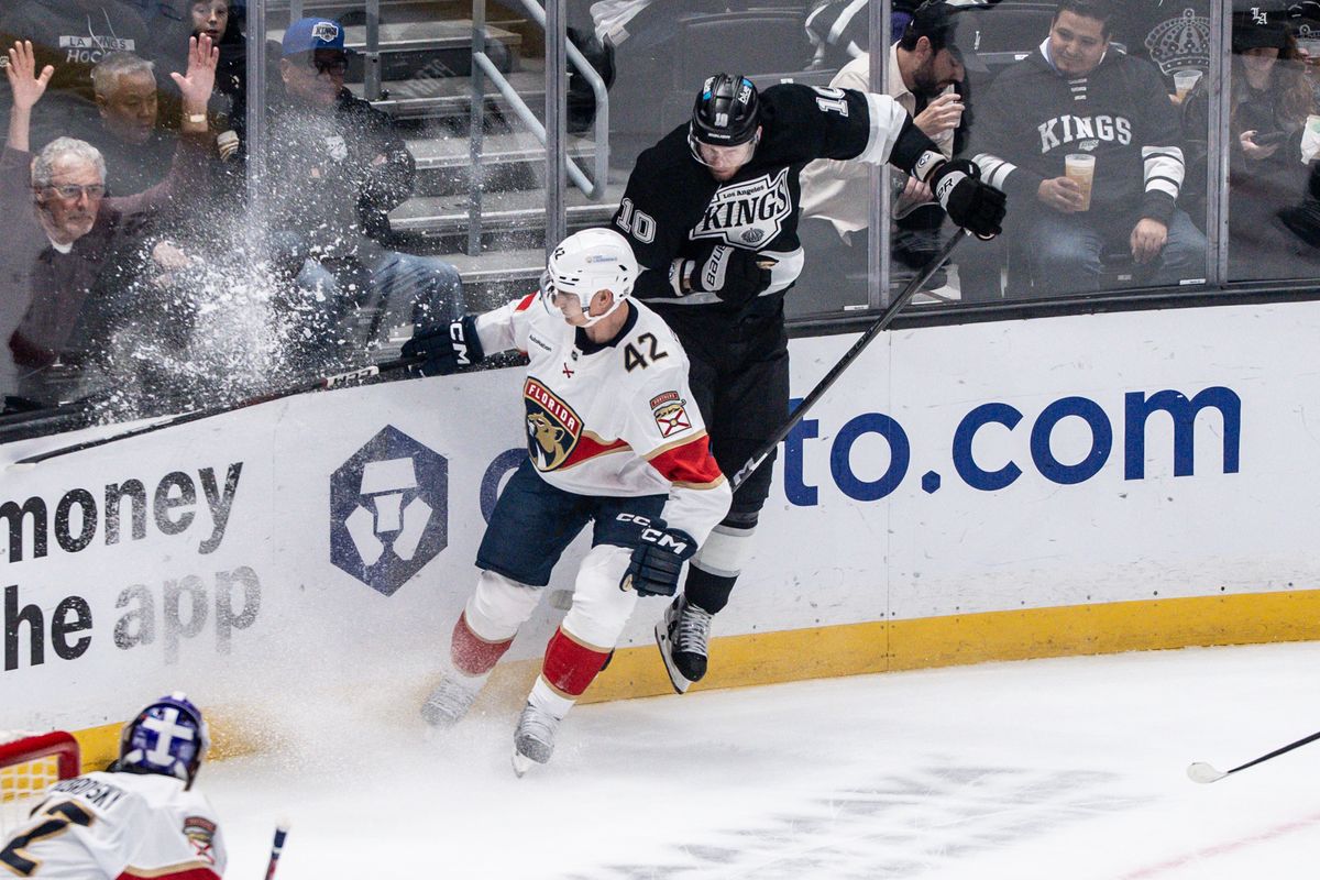 Los Angeles Kings Right Wing Corey Perry Moore (10) avoids getting slammed into the glass during an NHL hockey game against the Florida Panthers, Thursday November 6, 2025 in Los Angeles. Los Angeles Kings Right Wing Corey Perry Moore (10) avoids getting slammed into the glass during an NHL hockey game against the Florida Panthers, Thursday November 6, 2025 in Los Angeles.