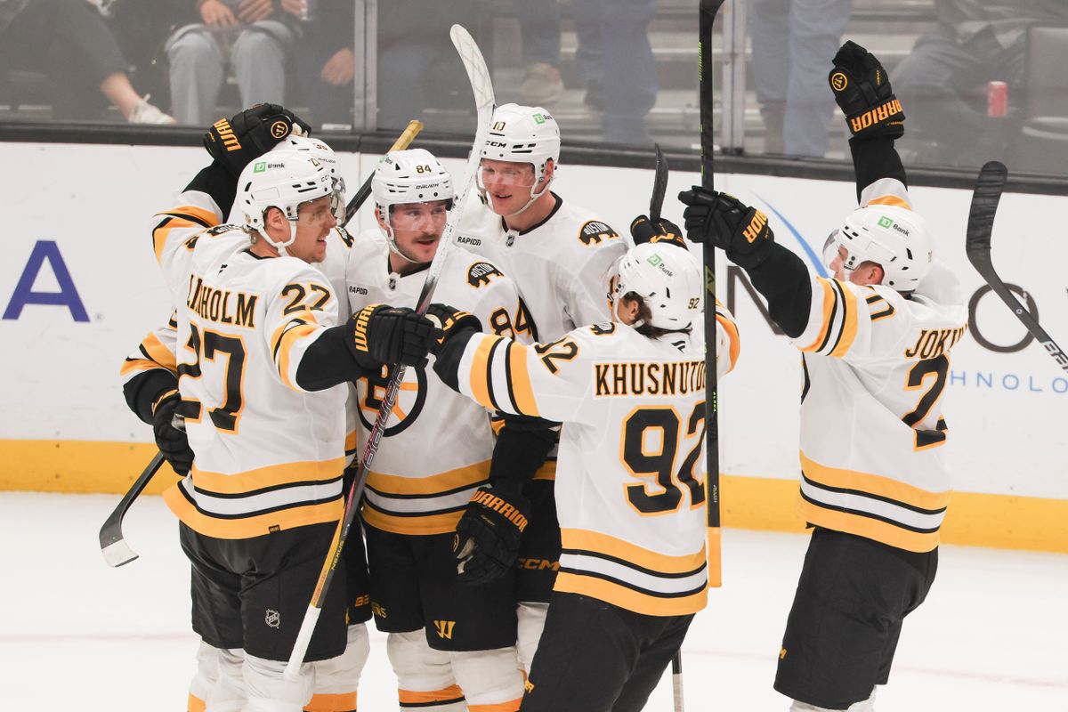 The Boston Bruins celebrate after scoring in overtime to win an NHL hockey game against the Los Angeles Kings, Friday November 21, 2025 in Los Angeles, Calif. The Boston Bruins celebrate after scoring in overtime to win an NHL hockey game against the Los Angeles Kings, Friday November 21, 2025 in Los Angeles, Calif.