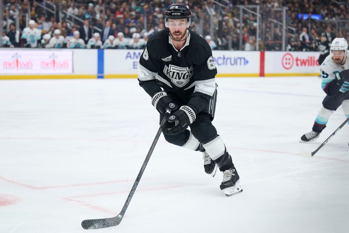 Los Angeles Kings defenseman Joel Edmundson (6) skates to defend against the Kraken at the crypto.com Arena on December 23,2025 in Los Angeles, California. Los Angeles Kings defenseman Joel Edmundson (6) skates to defend against the Kraken at the crypto.com Arena on December 23,2025 in Los Angeles, California.