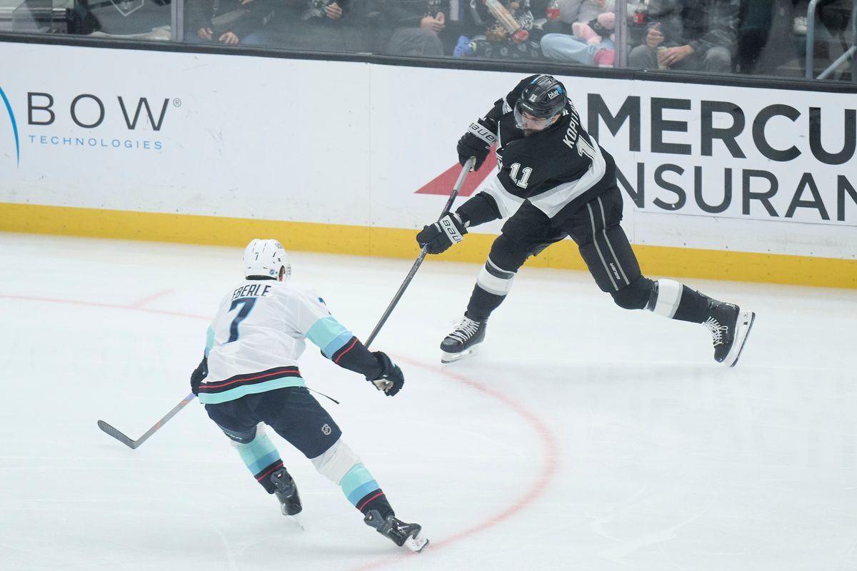 Los Angeles Kings center Anze Kopitar (11) shoots the puck against the Kraken at the crypto.com Arena on December 23,2025 in Los Angeles, California. Los Angeles Kings center Anze Kopitar (11) shoots the puck against the Kraken at the crypto.com Arena on December 23,2025 in Los Angeles, California.