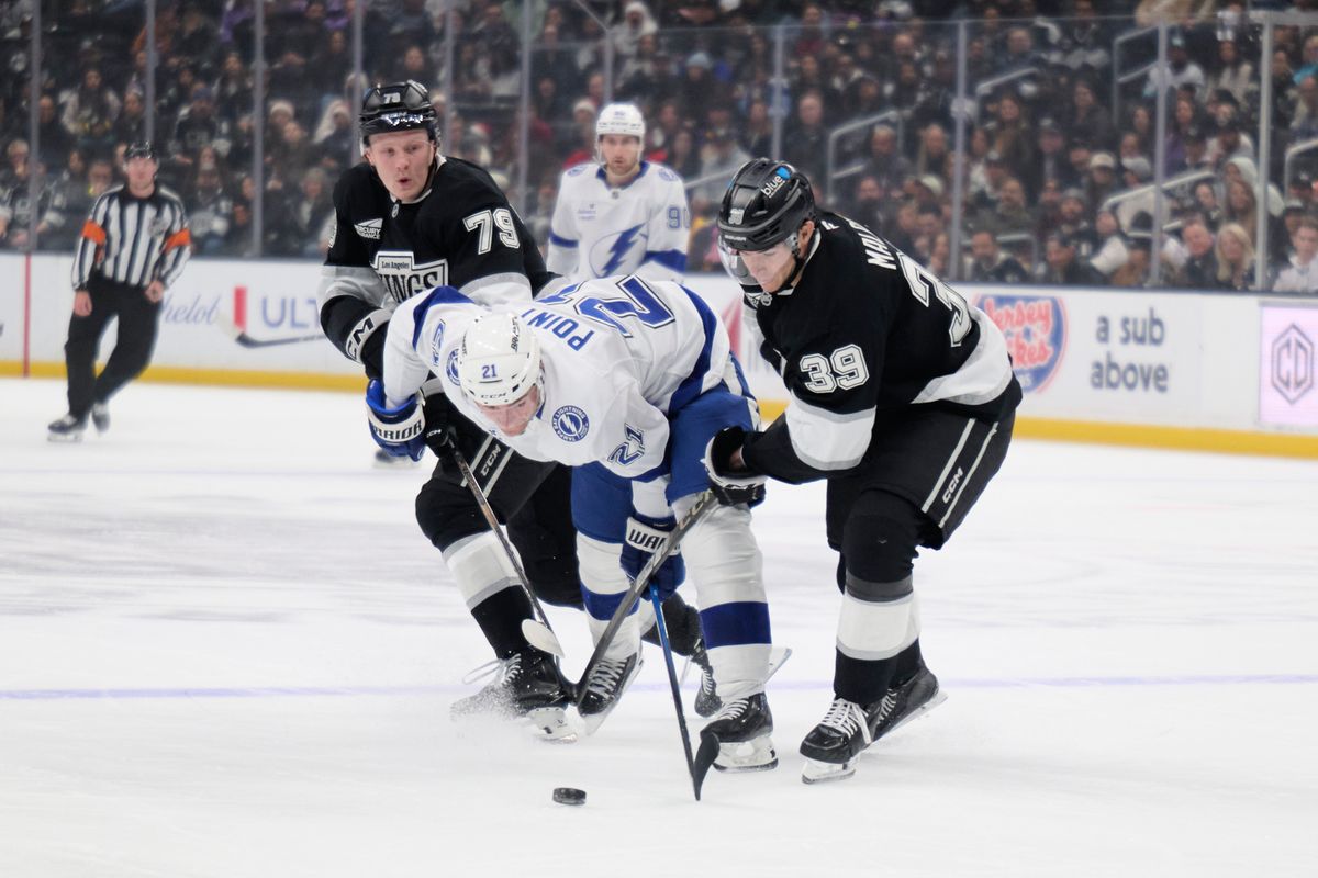 Los Angeles Kings left wing Jeff Malott (30) takes the puck against the Lightning at the Crypto Arena on January 1st, 2026 in Los Angeles California. Los Angeles Kings left wing Jeff Malott (30) takes the puck against the Lightning at the Crypto Arena on January 1st, 2026 in Los Angeles California.