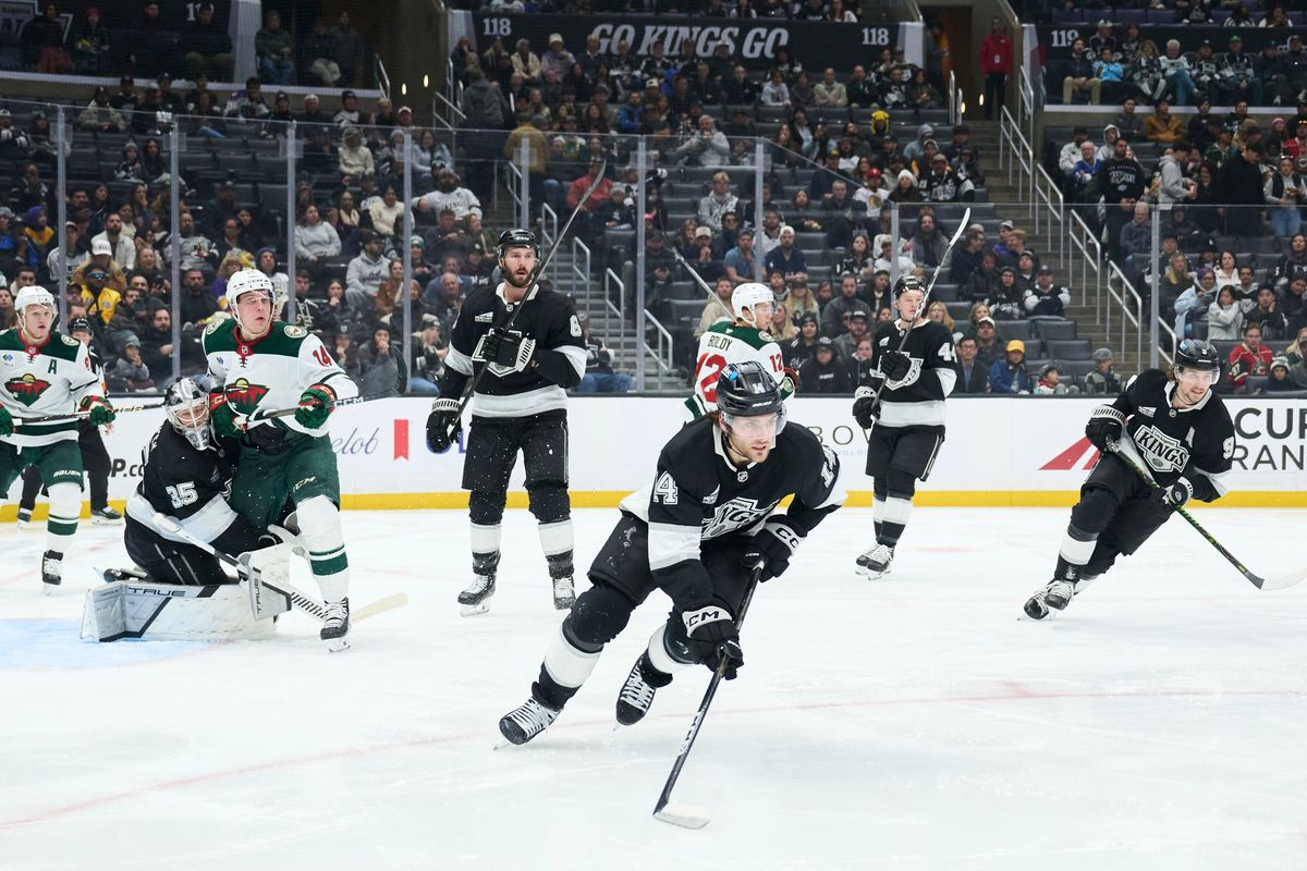 The Los Angeles Kings right wing Alex Laferriere (14) clears the puck against the Minnesota Wild at the Crypto Arena on January 5th, 2026 in Los Angeles California. The Los Angeles Kings right wing Alex Laferriere (14) clears the puck against the Minnesota Wild at the Crypto Arena on January 5th, 2026 in Los Angeles California.
