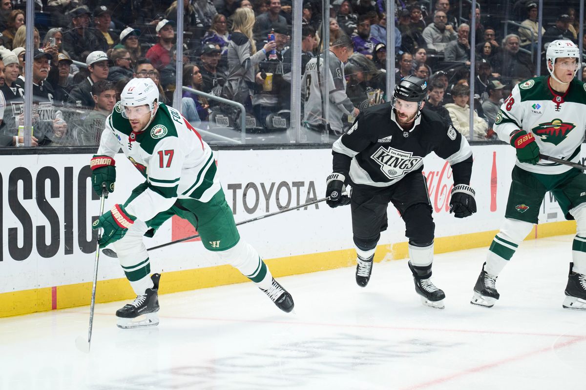 The Los Angeles Kings defender Joel Edmundson (6) races for the puck against the Minnesota Wild at the Crypto Arena on January 5th, 2026 in Los Angeles California. The Los Angeles Kings defender Joel Edmundson (6) races for the puck against the Minnesota Wild at the Crypto Arena on January 5th, 2026 in Los Angeles California.