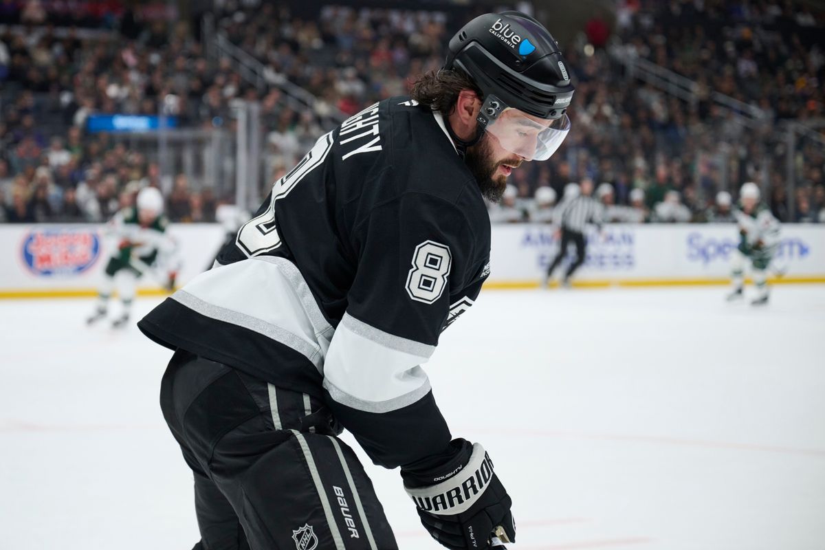 The Los Angeles Kings defender Drew Doughty (8) clears the puck against the Minnesota Wild at the Crypto Arena on January 5th, 2026 in Los Angeles California. The Los Angeles Kings defender Drew Doughty (8) clears the puck against the Minnesota Wild at the Crypto Arena on January 5th, 2026 in Los Angeles California.