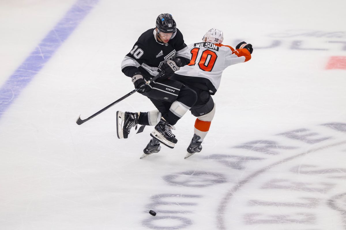 Artemi Panarin #10 of the Los Angeles Kings jumps over the stick of Garrett Wilson #10 of the Philadelphia Flyers during an NHL hockey game, Thursday March 19, 2026 in Los Angeles, Calif. Artemi Panarin #10 of the Los Angeles Kings jumps over the stick of Garrett Wilson #10 of the Philadelphia Flyers during an NHL hockey game, Thursday March 19, 2026 in Los Angeles, Calif.