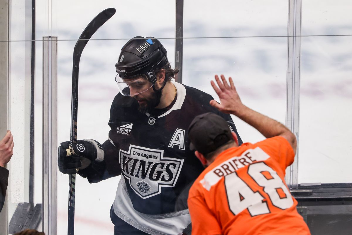 A Philadelphia Flyers fan interacts with Drew Doughty #8 of the Los Angeles Kings as he enters the penalty box during an NHL hockey game against the Philadelphia Flyers, Thursday March 19, 2026 in Los Angeles, Calif. A Philadelphia Flyers fan interacts with Drew Doughty #8 of the Los Angeles Kings as he enters the penalty box during an NHL hockey game against the Philadelphia Flyers, Thursday March 19, 2026 in Los Angeles, Calif.
