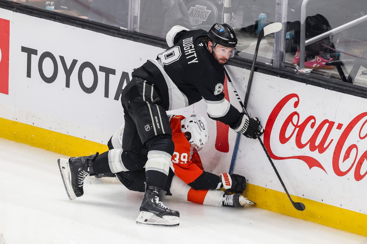 Drew Doughty #8 of the Los Angeles Kings checks Matvei Michkov #39 of the Philadelphia Flyers hard into the boards during an NHL hockey game, Thursday March 19, 2026 in Los Angeles, Calif. Drew Doughty #8 of the Los Angeles Kings checks Matvei Michkov #39 of the Philadelphia Flyers hard into the boards during an NHL hockey game, Thursday March 19, 2026 in Los Angeles, Calif.