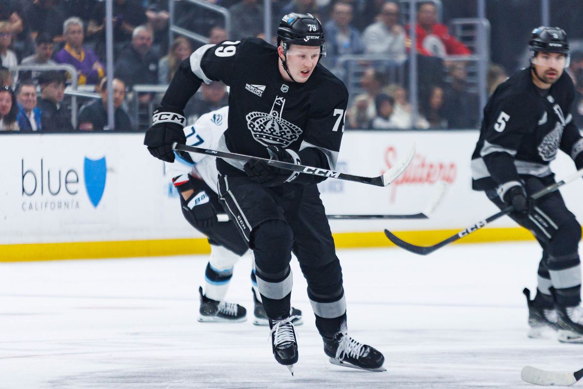 Los Angeles Kings center Samuel Helenius (#79) skates towards the puck during an NHL match against the Utah Mammoth on March 28, 2026 in Los Angeles, California. Los Angeles Kings center Samuel Helenius (#79) skates towards the puck during an NHL match against the Utah Mammoth on March 28, 2026 in Los Angeles, California.