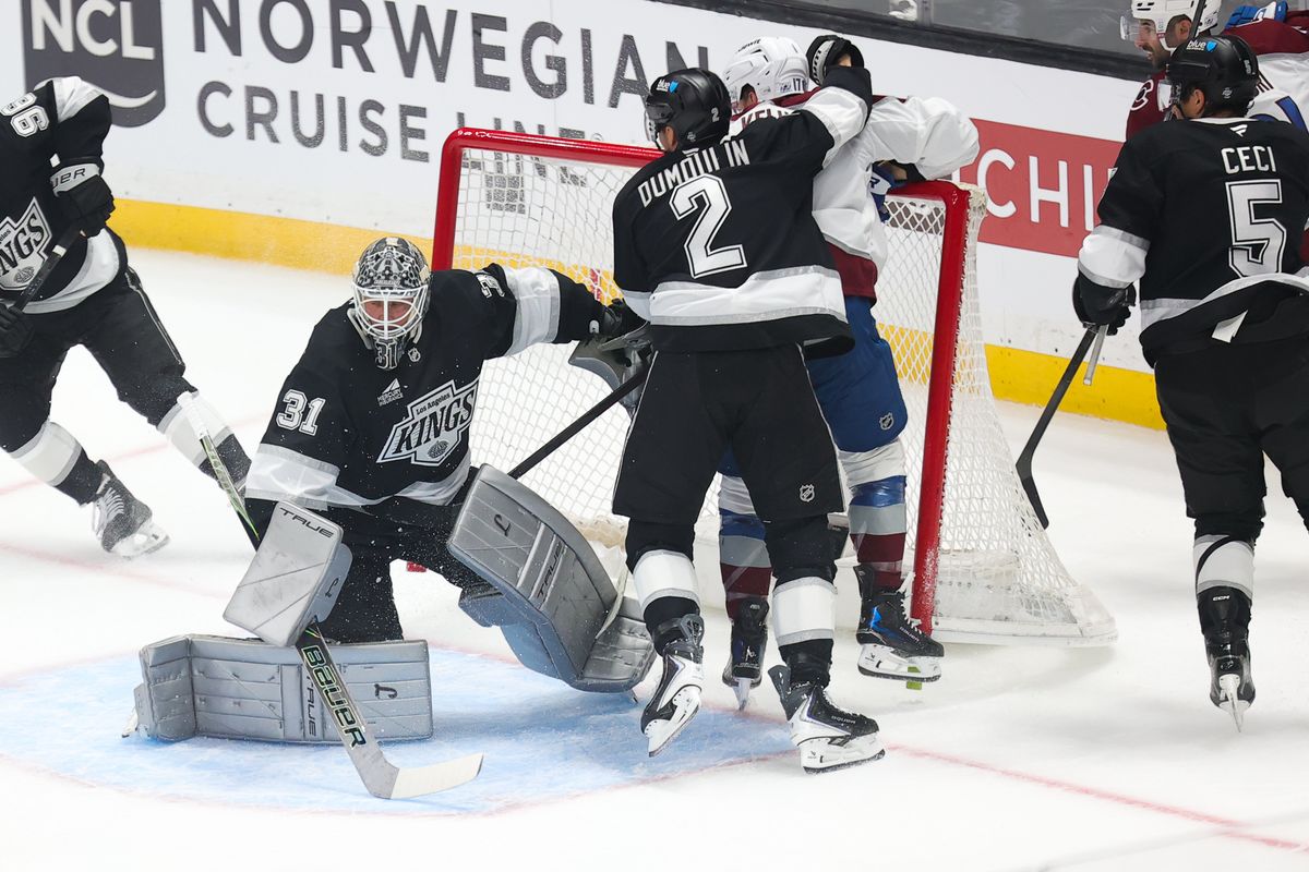 LA Kings defenseman Brian Dumoulin (2) crashes into the net during an NHL game against the Colorado Avalanche on April 23, 2026 in Los Angeles, CA. LA Kings defenseman Brian Dumoulin (2) crashes into the net during an NHL game against the Colorado Avalanche on April 23, 2026 in Los Angeles, CA.
