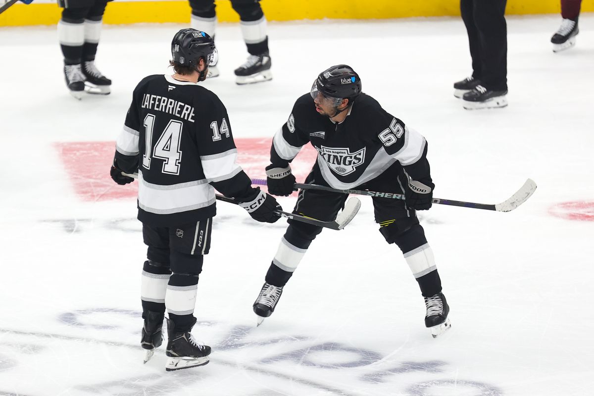 LA Kings right wing Alex Laferriere (14) and right wing Quinton Byfield (55) discuss strategy during an NHL game against the Colorado Avalanche on April 23, 2026 in Los Angeles, CA. LA Kings right wing Alex Laferriere (14) and right wing Quinton Byfield (55) discuss strategy during an NHL game against the Colorado Avalanche on April 23, 2026 in Los Angeles, CA.