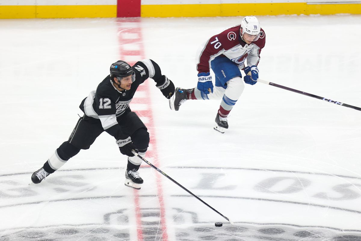 LA Kings left wing Trevor Moore (12) skates with the puck during an NHL game against the Colorado Avalanche on April 23, 2026 in Los Angeles, CA. LA Kings left wing Trevor Moore (12) skates with the puck during an NHL game against the Colorado Avalanche on April 23, 2026 in Los Angeles, CA.