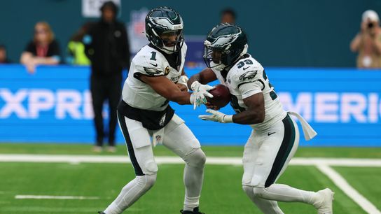 Oct 11, 2026; Tottenham, ENG; Philadelphia Eagles quarterback Jalen Hurts (1) hands off to defensive back Cooper DeJean (33) during the fourth quarter against the Jacksonville Jaguars at Tottenham Hotspur Stadium. Oct 11, 2026; Tottenham, ENG; Philadelphia Eagles quarterback Jalen Hurts (1) hands off to defensive back Cooper DeJean (33) during the fourth quarter against the Jacksonville Jaguars at Tottenham Hotspur Stadium.