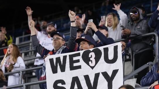 May 17, 2025; San Jose, California, USA; A fan of Bay FC holds up a sign in support of Angel City FC defender Savy King (3) after the game at PayPal Park. 