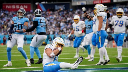 Los Angeles Chargers quarterback Justin Herbert (10) scores a touchdown against the Tennessee Titans during the fourth quarter at Nissan Stadium in Nashville, Tenn., Sunday, Nov. 2, 2025. Los Angeles Chargers quarterback Justin Herbert (10) scores a touchdown against the Tennessee Titans during the fourth quarter at Nissan Stadium in Nashville, Tenn., Sunday, Nov. 2, 2025.