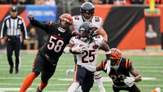 Nov 2, 2025; Cincinnati, Ohio, USA; Chicago Bears running back Kyle Monangai (25) runs the ball against Cincinnati Bengals defensive end Joseph Ossai (58) and cornerback Dax Hill (23) during the third quarter at Paycor Stadium. Nov 2, 2025; Cincinnati, Ohio, USA; Chicago Bears running back Kyle Monangai (25) runs the ball against Cincinnati Bengals defensive end Joseph Ossai (58) and cornerback Dax Hill (23) during the third quarter at Paycor Stadium.