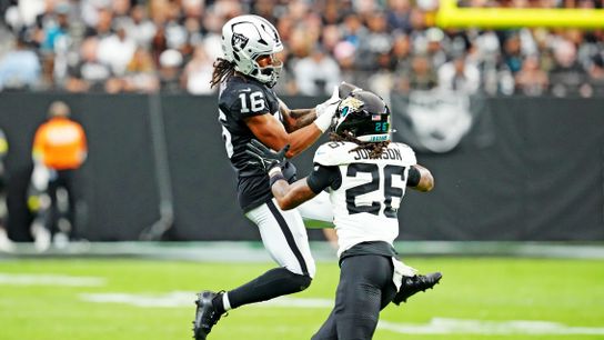 Nov 2, 2025; Paradise, Nevada, USA; Jacksonville Jaguars safety Antonio Johnson (26) tackles Las Vegas Raiders wide receiver Jakobi Meyers (16) during the second half at Allegiant Stadium. Nov 2, 2025; Paradise, Nevada, USA; Jacksonville Jaguars safety Antonio Johnson (26) tackles Las Vegas Raiders wide receiver Jakobi Meyers (16) during the second half at Allegiant Stadium.