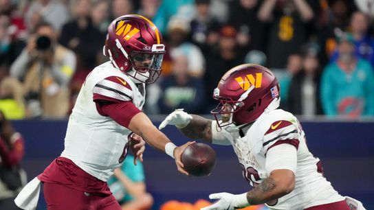 Nov 16, 2025; Madrid, Spain; Washington Commanders quarterback Marcus Mariota (8) hands the ball to Washington Commanders running back Chris Rodriguez Jr. (36) against the Miami Dolphins in the third quarter during the 2025 NFL Madrid Game at Santiago Bernabeu Stadium. Nov 16, 2025; Madrid, Spain; Washington Commanders quarterback Marcus Mariota (8) hands the ball to Washington Commanders running back Chris Rodriguez Jr. (36) against the Miami Dolphins in the third quarter during the 2025 NFL Madrid Game at Santiago Bernabeu Stadium.