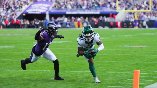 Nov 23, 2025; Baltimore, Maryland, USA; New York Jets wide reciever John Metchie III (3) scores a touchdown as Baltimore Ravens safety Alohi Gilman (12) defends during the second quarter at M&T Bank Stadium. Nov 23, 2025; Baltimore, Maryland, USA; New York Jets wide reciever John Metchie III (3) scores a touchdown as Baltimore Ravens safety Alohi Gilman (12) defends during the second quarter at M&T Bank Stadium.