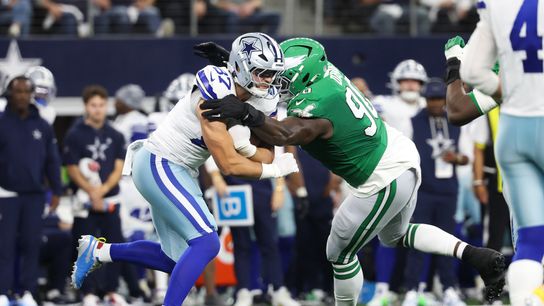 Nov 23, 2025; Arlington, Texas, USA; Dallas Cowboys tight end Jake Ferguson (87) is tackled by Philadelphia Eagles defensive tackle Jordan Davis (90) in the first quarter at AT&T Stadium. Nov 23, 2025; Arlington, Texas, USA; Dallas Cowboys tight end Jake Ferguson (87) is tackled by Philadelphia Eagles defensive tackle Jordan Davis (90) in the first quarter at AT&T Stadium.