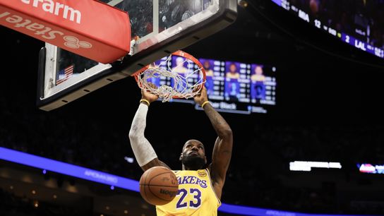 Los Angeles Lakers forward LeBron James (23) dunks against the Miami Heat during the first half at Kaseya Center. Los Angeles Lakers forward LeBron James (23) dunks against the Miami Heat during the first half at Kaseya Center.