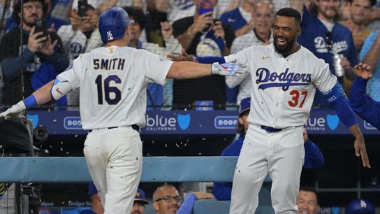 Los Angeles Dodgers catcher Will Smith (16) celebrates with right fielder Teoscar Hernandez (37) after hitting a two-run home run during the eighth inning against the Arizona Diamondbacks at Dodger St... Los Angeles Dodgers catcher Will Smith (16) celebrates with right fielder Teoscar Hernandez (37) after hitting a two-run home run during the eighth inning against the Arizona Diamondbacks at Dodger St...