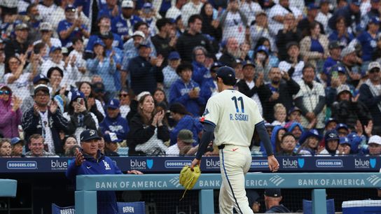Fans acknowledge Los Angeles Dodgers starting pitcher Roki Sasaki (11) after a pitching change against the Chicago Cubs during the sixth inning at Dodger Stadium. Fans acknowledge Los Angeles Dodgers starting pitcher Roki Sasaki (11) after a pitching change against the Chicago Cubs during the sixth inning at Dodger Stadium.